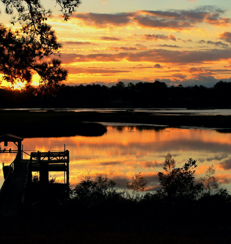 Sunset image of a river in Shallotte, NC